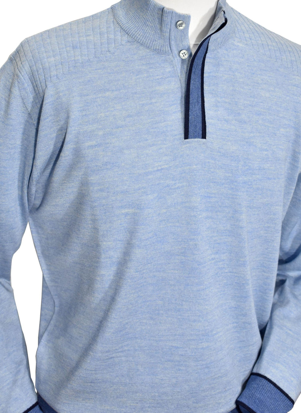 The finely knitted, Italian merino wool blend fabric is both light weight and elegantly soft to the touch.  The blue shade with darker accents works well with any color bottoms and is stylish alone or over another shirt.  Covered button mock closure and contrast color for unique style.   Classic fit and classic ribbed cuffs and waist bands. By Marcello Sport