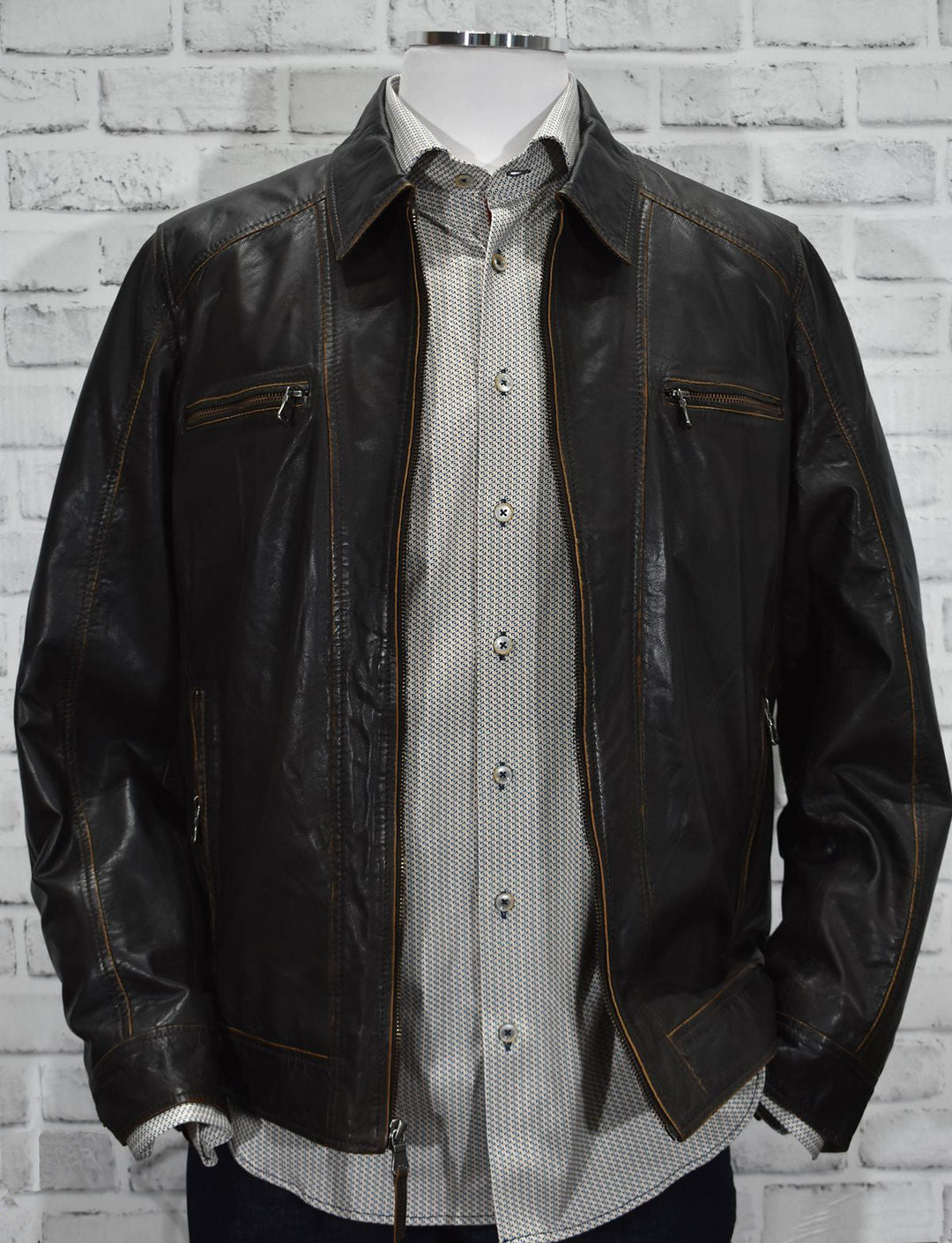 Saturday night out or riding is the best when you have an excellent, soft leather coat with camel raw edges and a soft polo style collar.  The look is fashionable yet classic and portrays a celebrity image.   Open bottom and open adjustable cuffs for added comfort and style.   Classic fit. Biker Leather by Marcello Sport