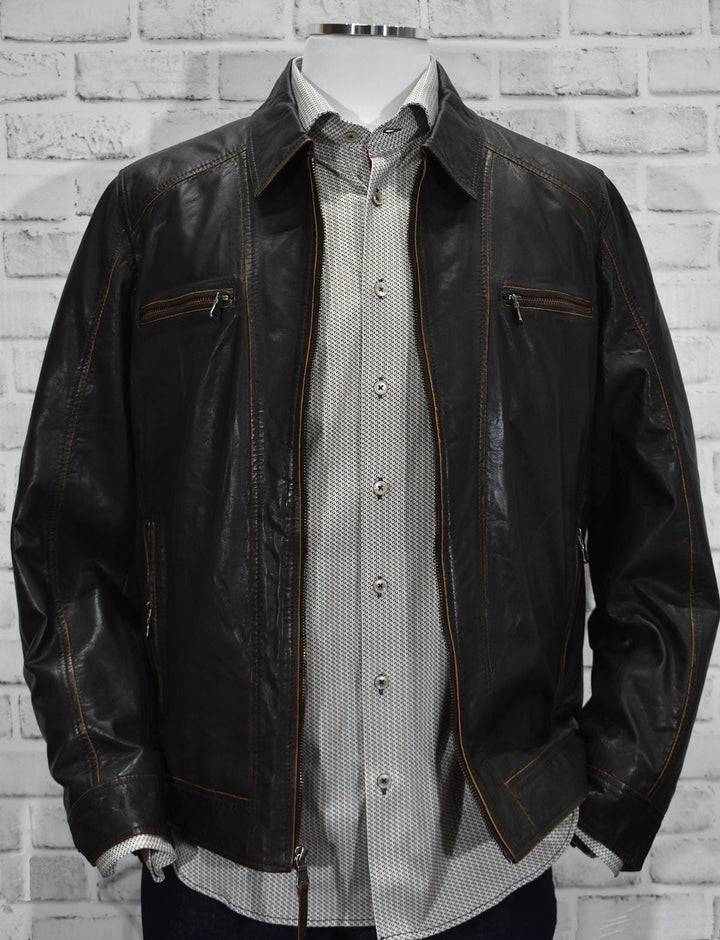 Saturday night out or riding is the best when you have an excellent, soft leather coat with camel raw edges and a soft polo style collar.  The look is fashionable yet classic and portrays a celebrity image.   Open bottom and open adjustable cuffs for added comfort and style.   Classic fit. Biker Leather by Marcello Sport