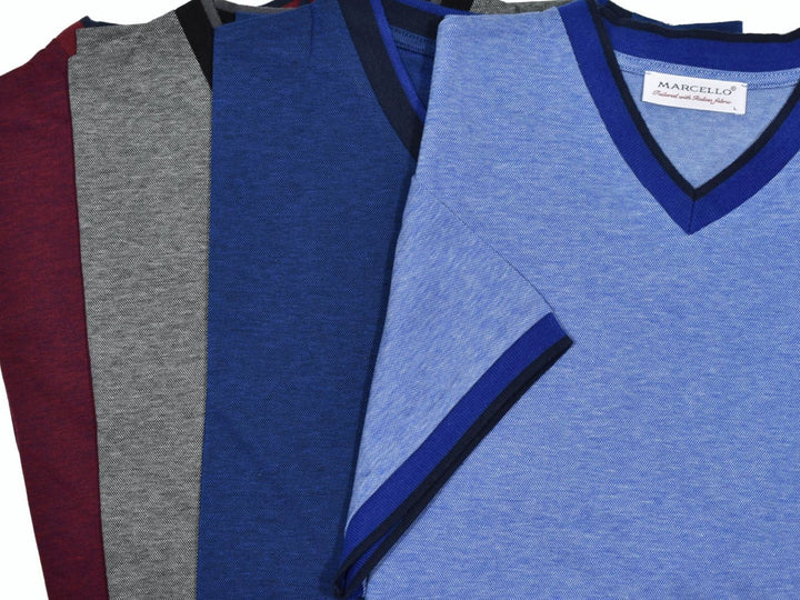 Cotton rich, royal oxford fabric always feels good and looks perfect.  The v neck model is contemporary in nature with a high v silhouette and two color contrast fabric.  Contrast edge fabric adds a sporty image to a classic v neck model.  Classic fit.   Colors: Wine, Charcoal Indigo, Sky