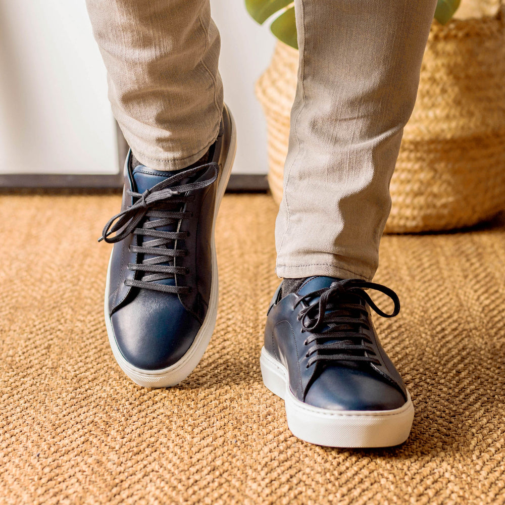 Classic men's sneaker, with a fashion leather upper, has never been more popular than now.  Simple clean design is both sleek and casual, perfect for everyday wear and sets a contemporary image.  Classic fit. Leather sneaker by Marcello