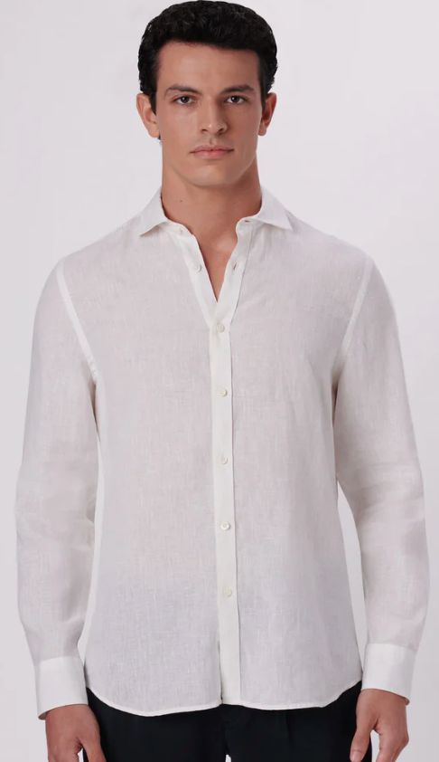The long sleeve Bugatchi Linen shirt is perfect for the modern man. Its classic fit is made with lightweight soft linen fabric in three colors, sure to give you a comfortable and stylish look. Its perfect for a day in the office or an evening out.  Classic fit.