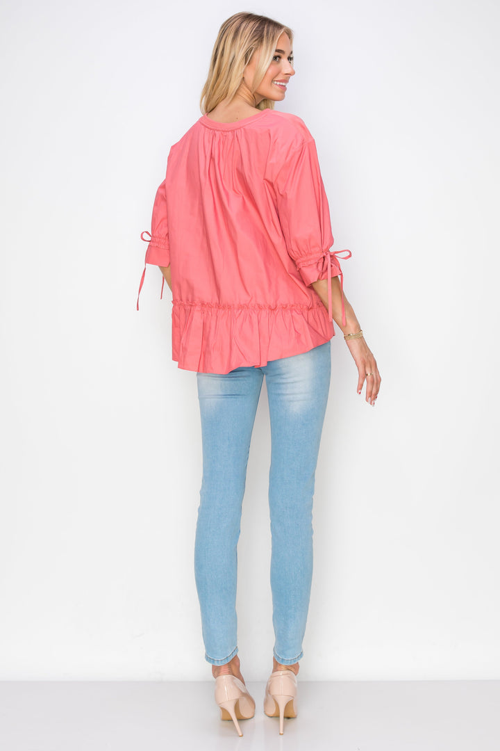 Reida Stretch Pointe Knit Top