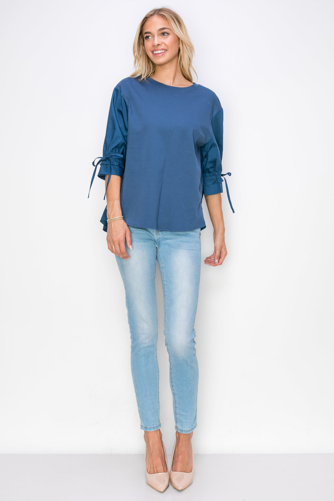 Reida Stretch Pointe Knit Top