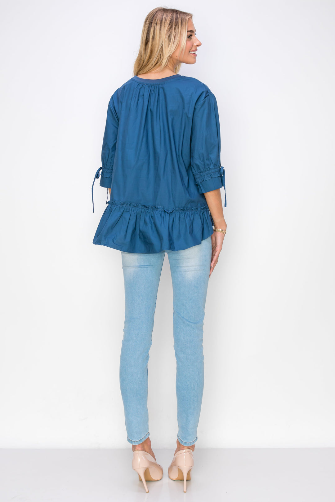 Reida Stretch Pointe Knit Top