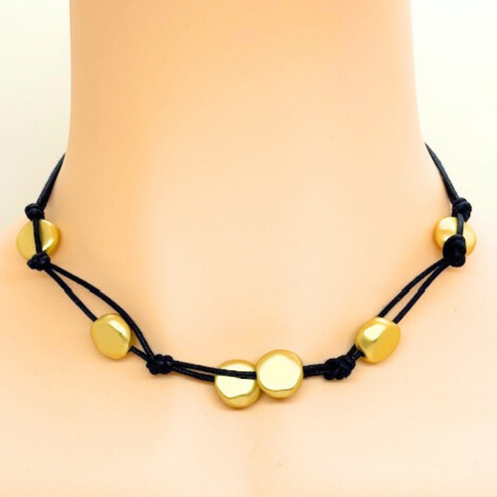 Matte Gold Bead Woven Necklace On Black Linen