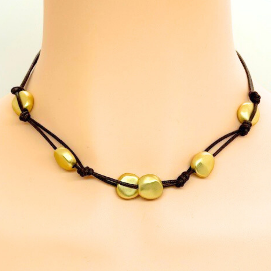 Matte Gold Bead Woven Necklace On Chocolate Linen