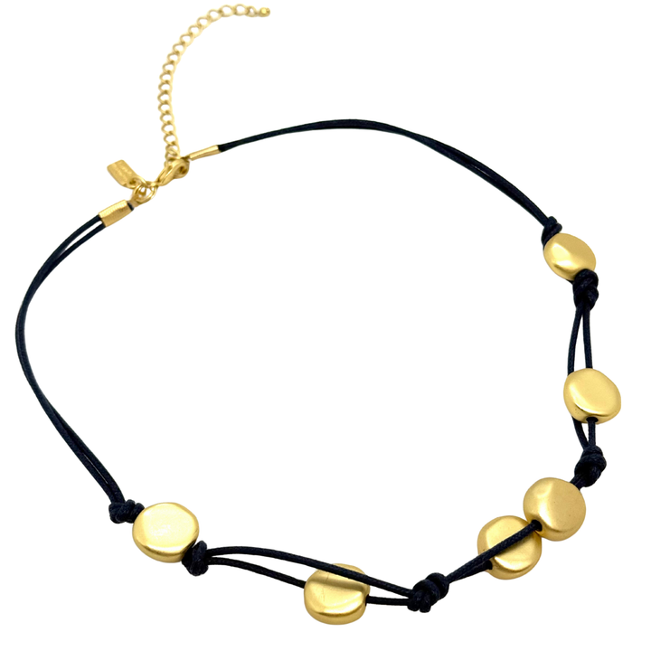 Matte Gold Bead Woven Necklace On Black Linen