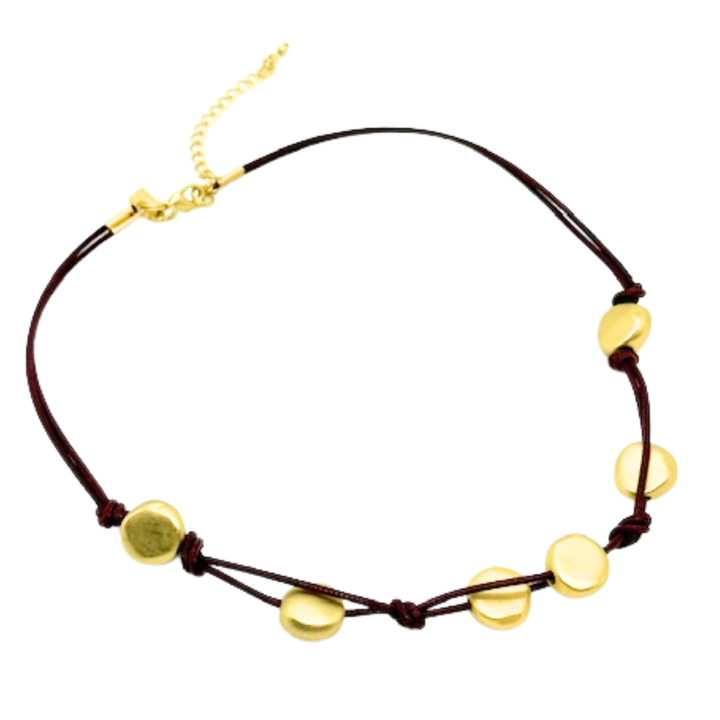 Matte Gold Bead Woven Necklace On Burgundy Linen