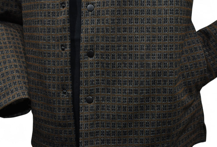 The perfect combination of chocolate and black with a touch of tan in a cool contemporary snap front shacket model by Marcello.