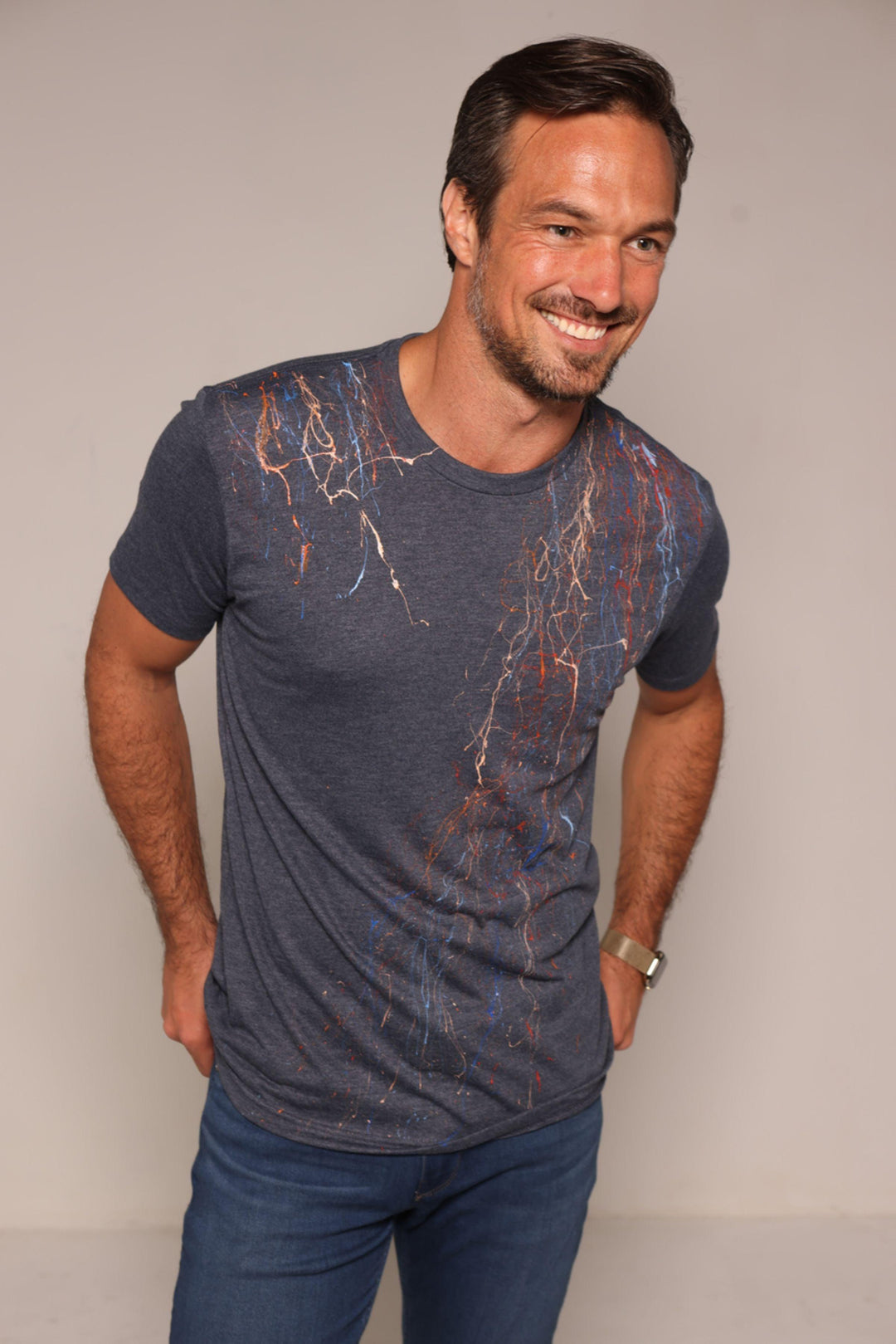 Tee shirts are not just tee shirts anymore. Our hand painted tees are individually painted by artists making each one a unique piece of art and making them stand out from other tee shirts in quality and style.  Elevate your casual fashion lifestyle with this hand painted indigo colored tee.