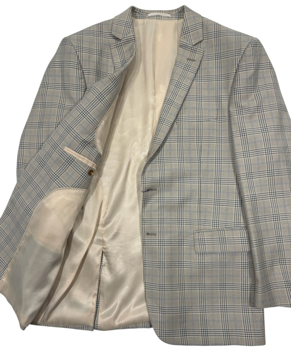 Tan sport coat.