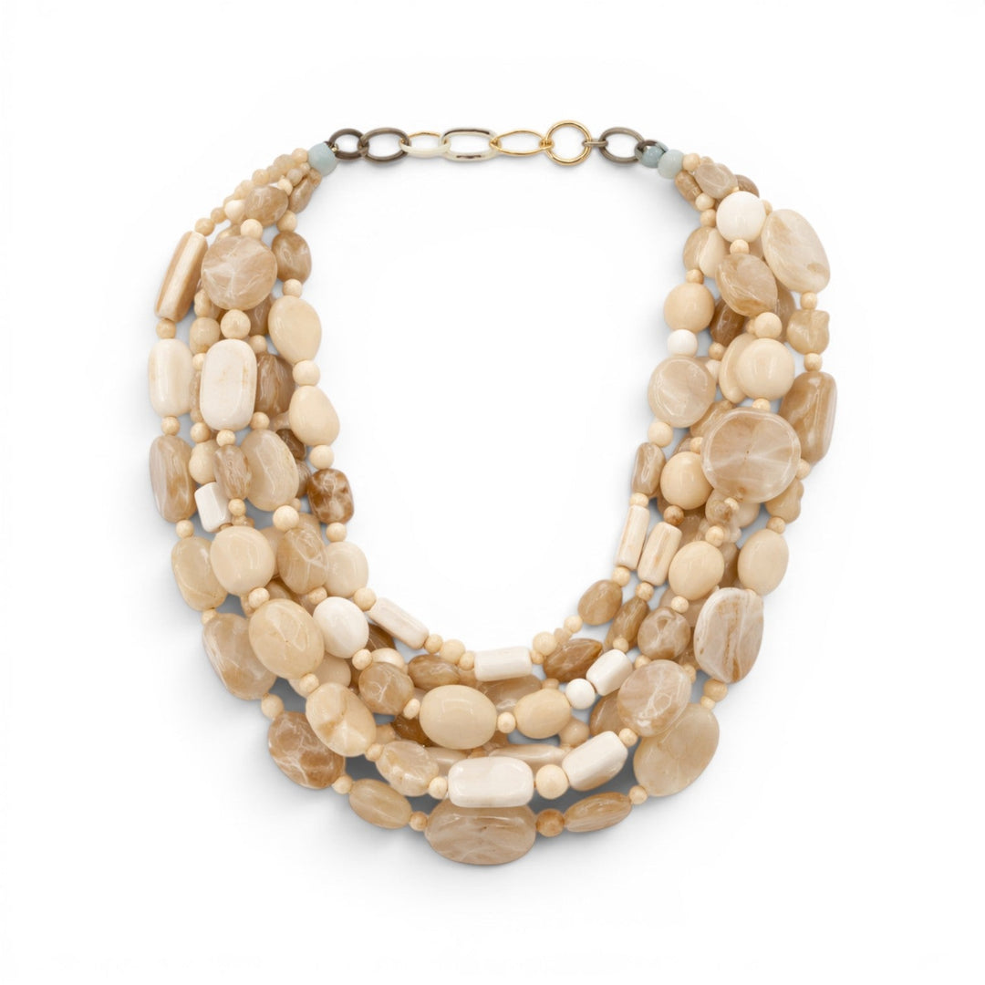 Otilia Multi Strand Shades Of Ivory Resin Beads