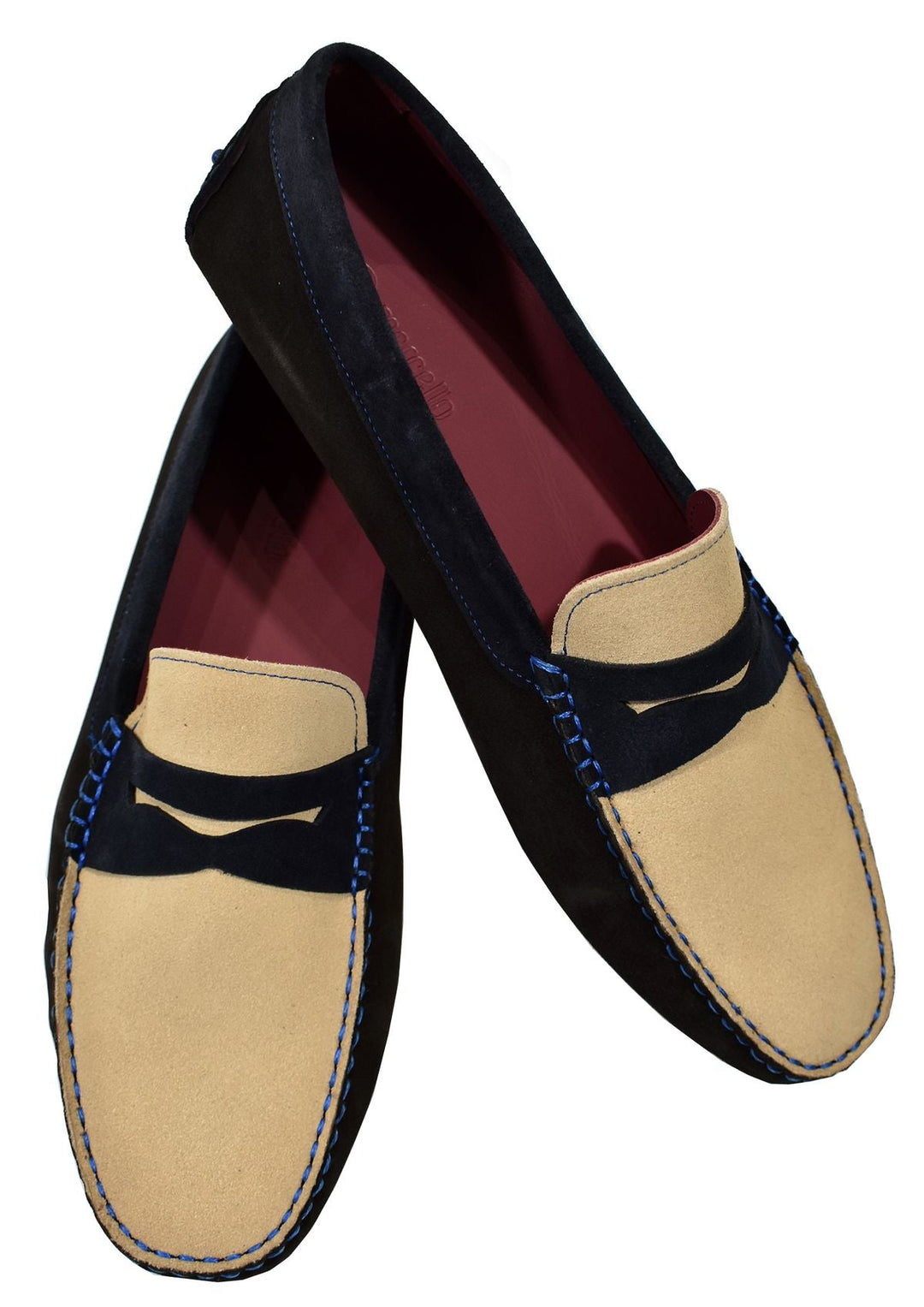 Define style with a mix of chocolate, tan and navy colored fine suede and a cool royal blue bottom dotted sole for added fashion.  The moccasin is a driver model with the bottom sole feature also on the heel.  Classic fit.  Hand crafted in Spain.  Marcello shoes.