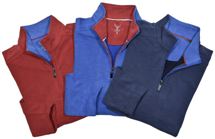 Look sharp in any occasion with this cool 1/4 zip model. Crafted from polynosic fabric, its perfect weight and feel pair perfectly with its waffle weave textured fabric and classic fit. Choose from Red, Navy, and Blue to make a bold statement.  Open sleeve and bottom for a contemporary look with a double track seam running down the shoulder and sleeve.