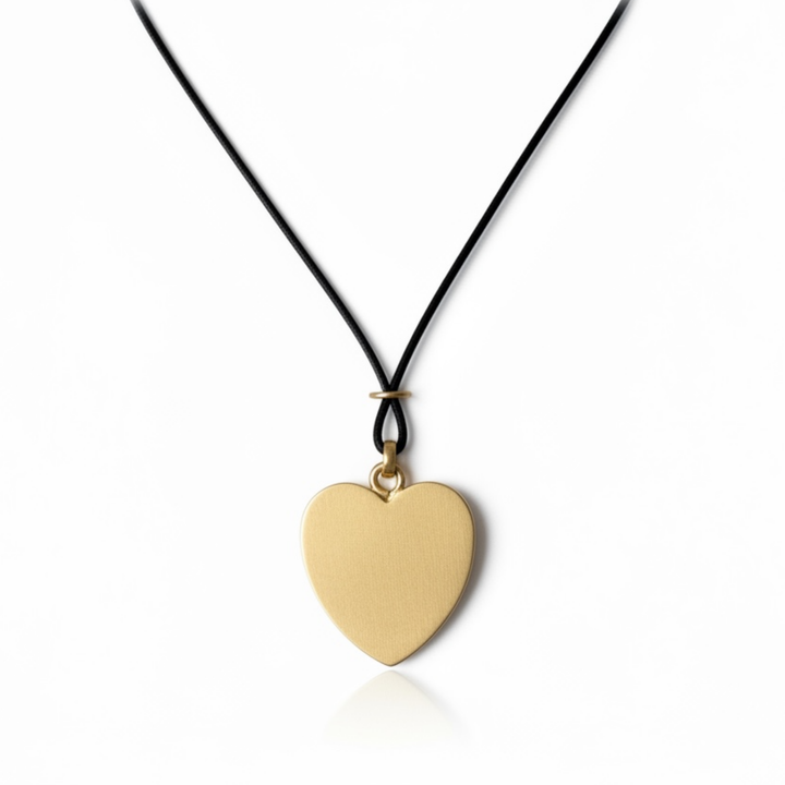 Matte Gold Starburst Pendant And Black Linen Cord Criss Cross Design Necklace