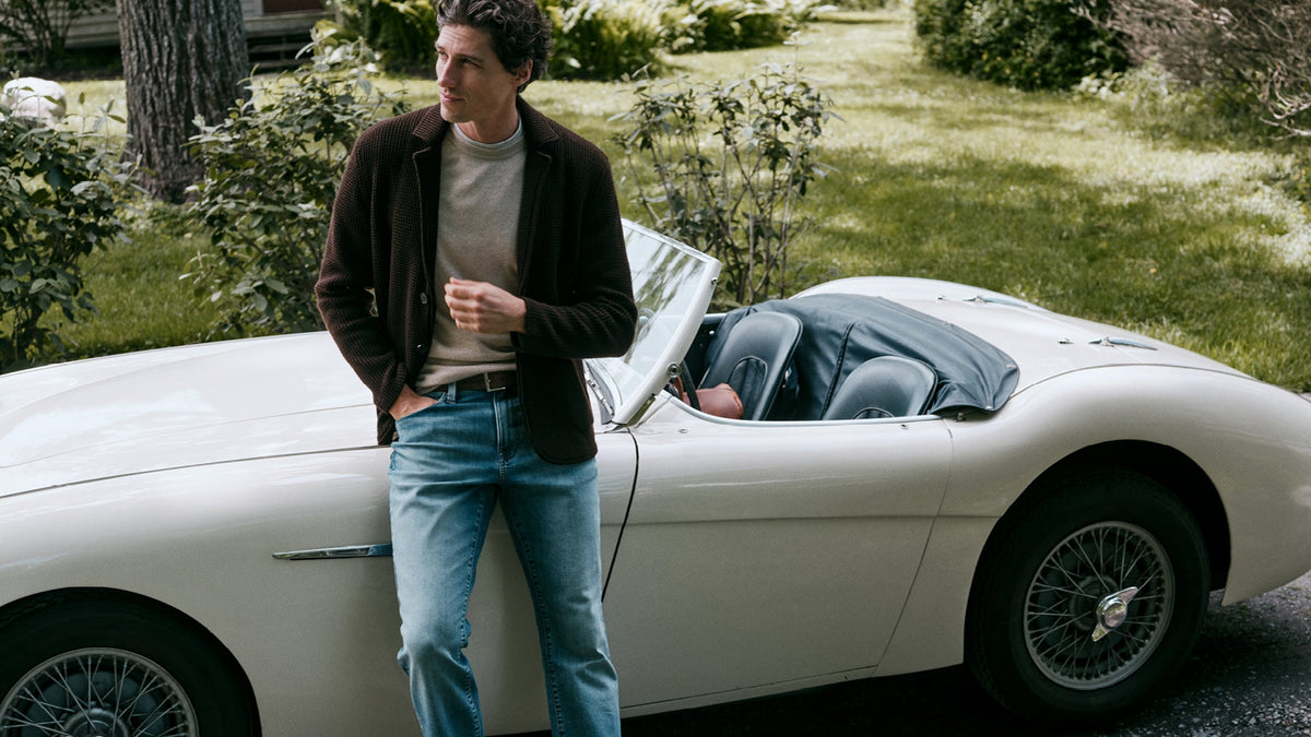 34 Heritage cardigan and jeans with a vintage roadster