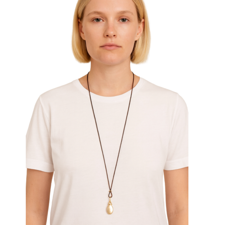 Matte Gold Pillow Style Pendant On 36" Bronze Linen Cord