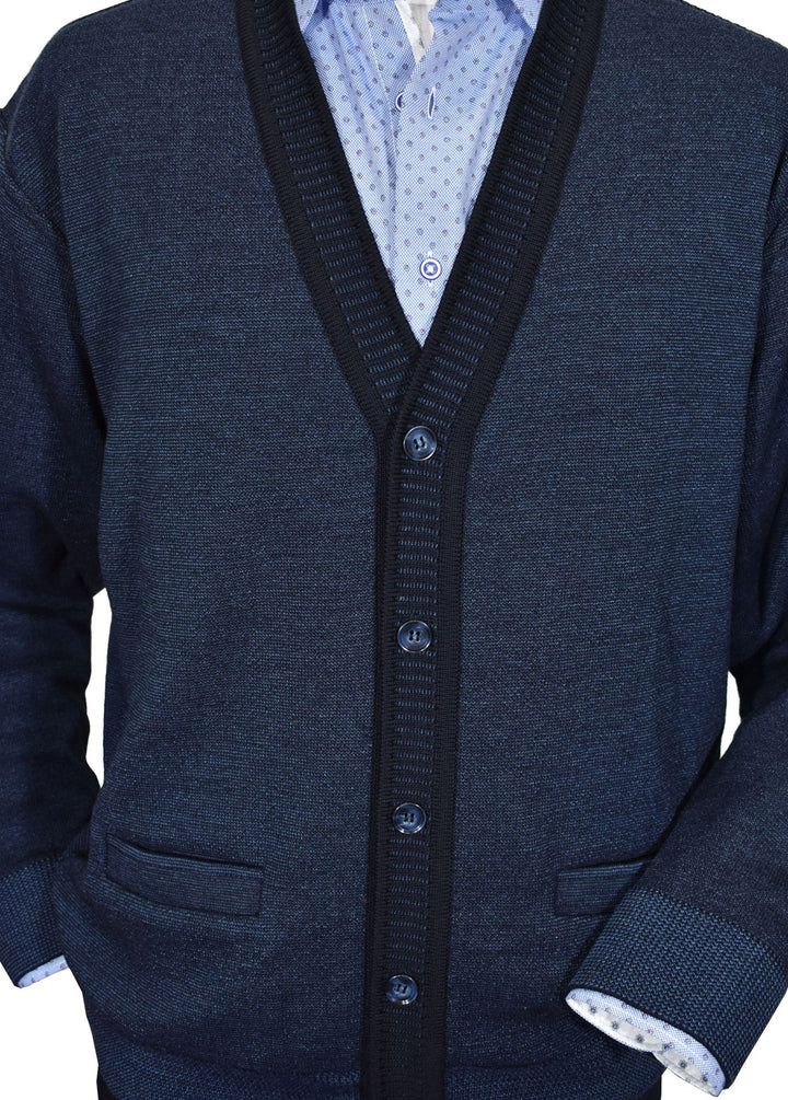 Exclusively Marcello, the classic cardigan model in rich indigo melange with a fashion edge detailing in contrast color. The perfect layering piece utilized for comfort and style. Light to medium weight. Soft Italian merino wool blend.  Matched buttons.  Classic fit.